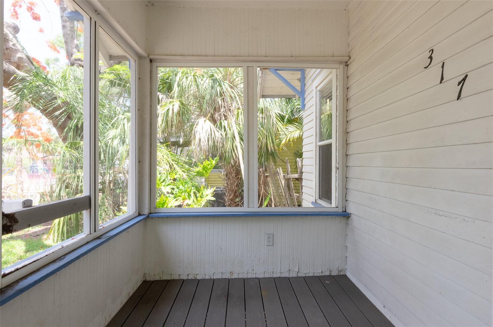 Another view porch, this home needs to be renovated or could be the perfect ot for YOU to build on.