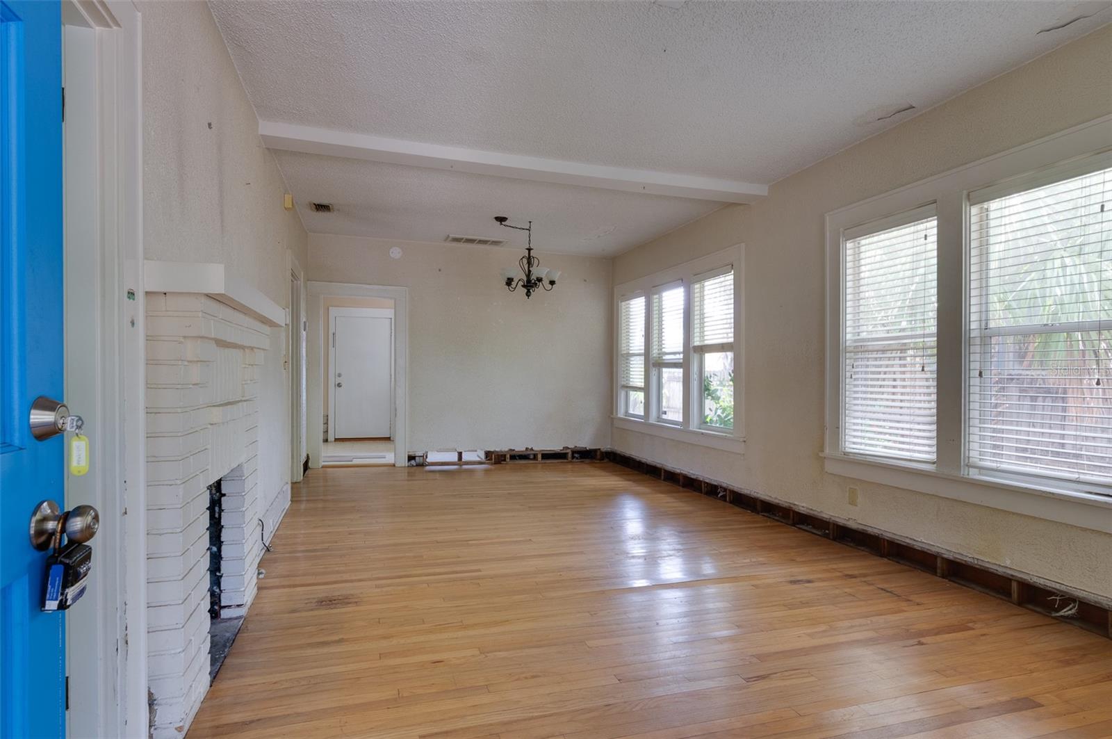 Fireplace, wood floors! Higher ceilings. NEEDS renovation. Home was remediated.  Your canvas or tear down.