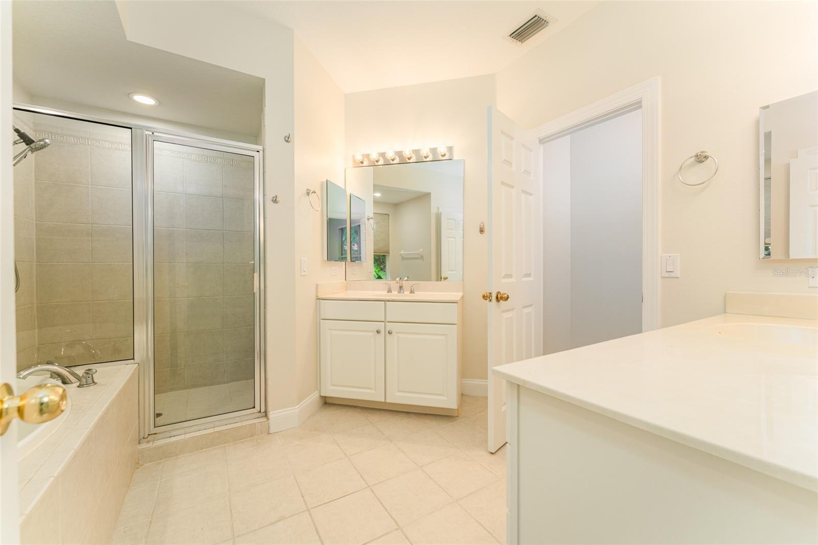 EnSuite Bath with Dual Vanities, Soaking Tub, Walk in Shower