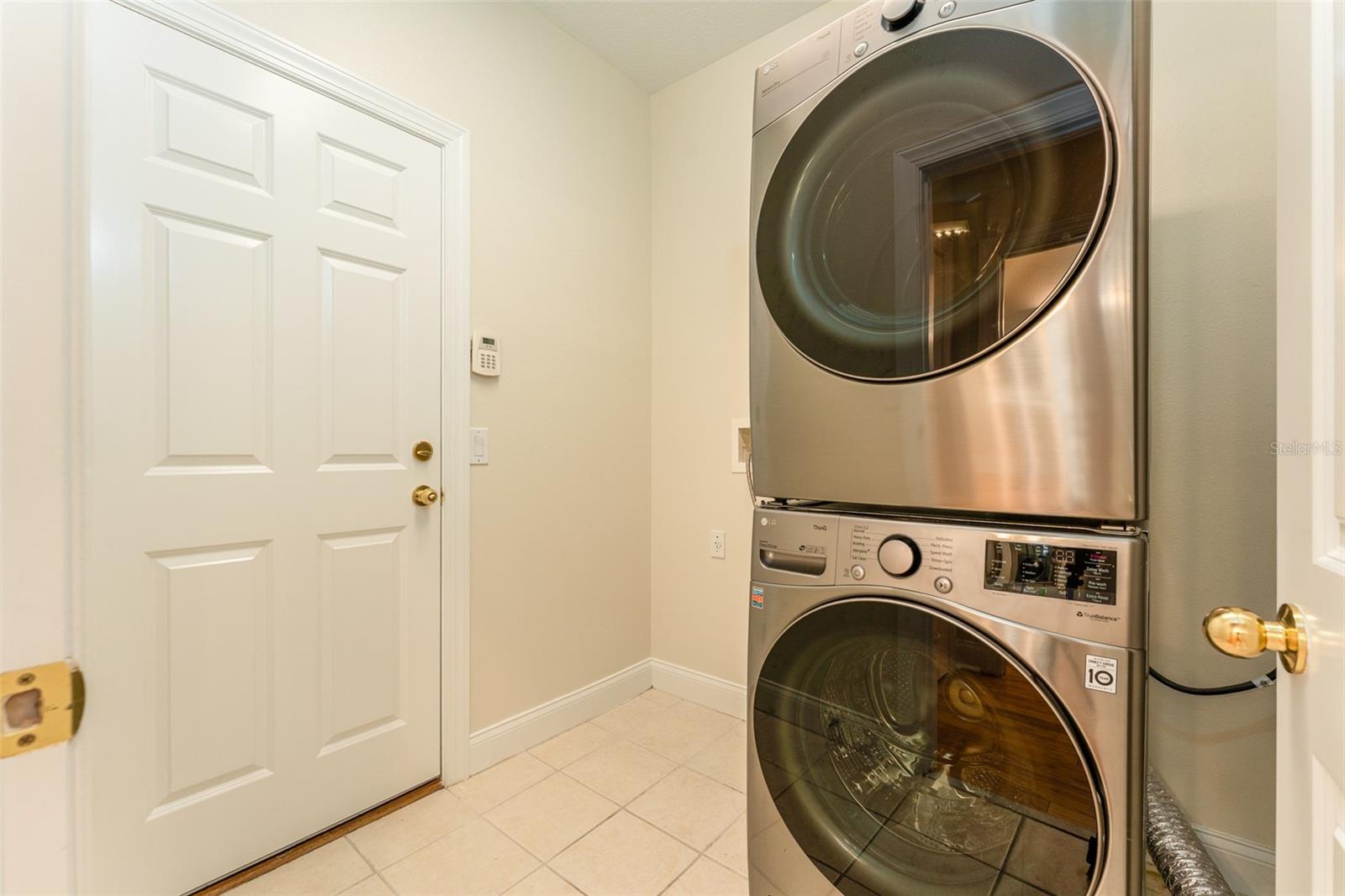 Downstairs Laundry Room with Washer & Dryer That Convey