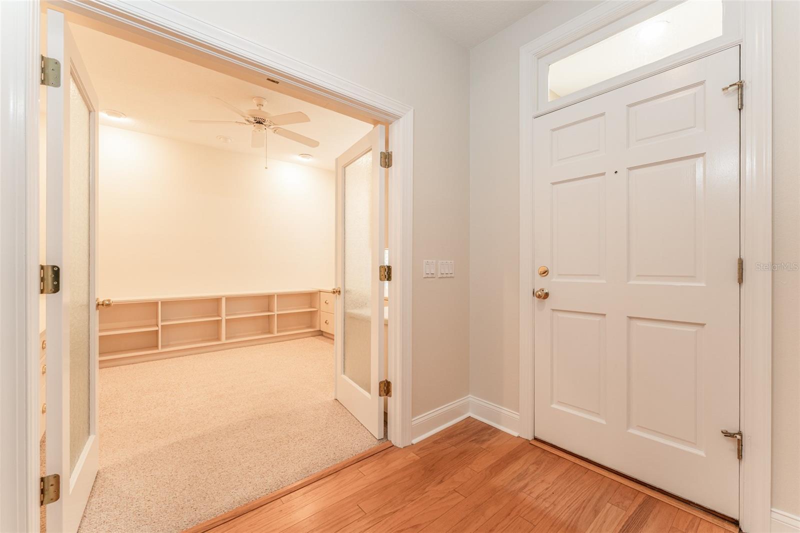Step onto beautiful real wood flooring as you enter