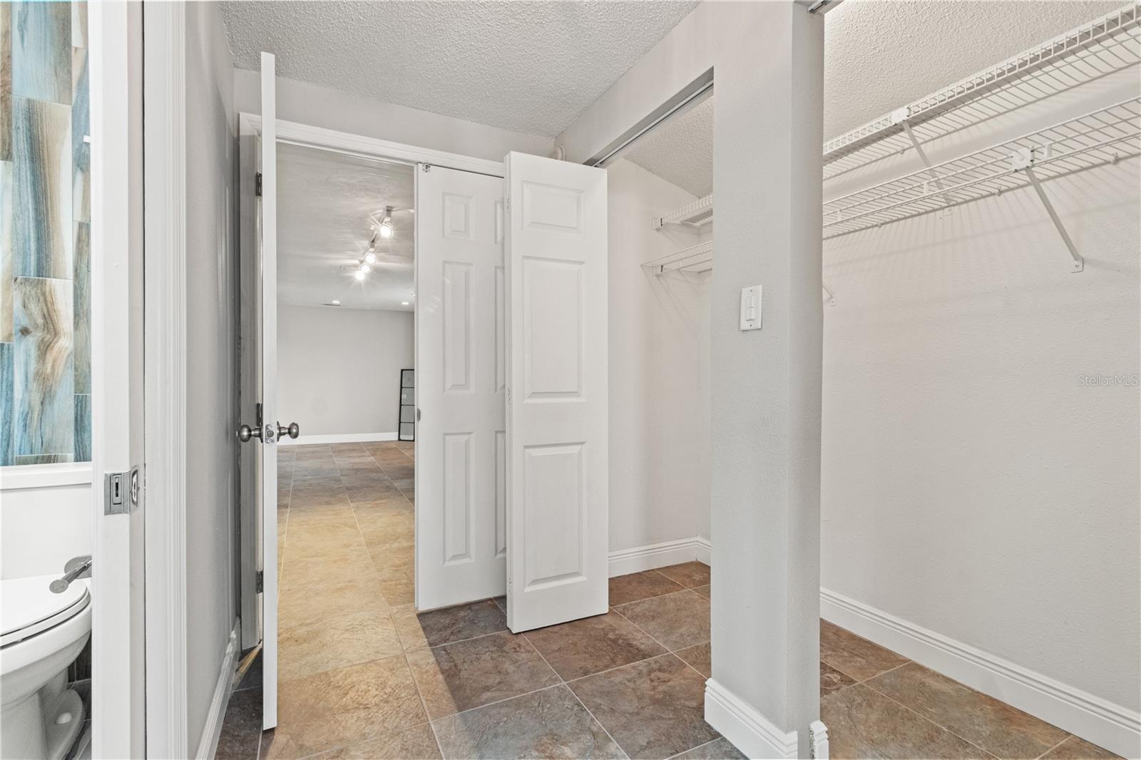 Primary bedroom dueling closets