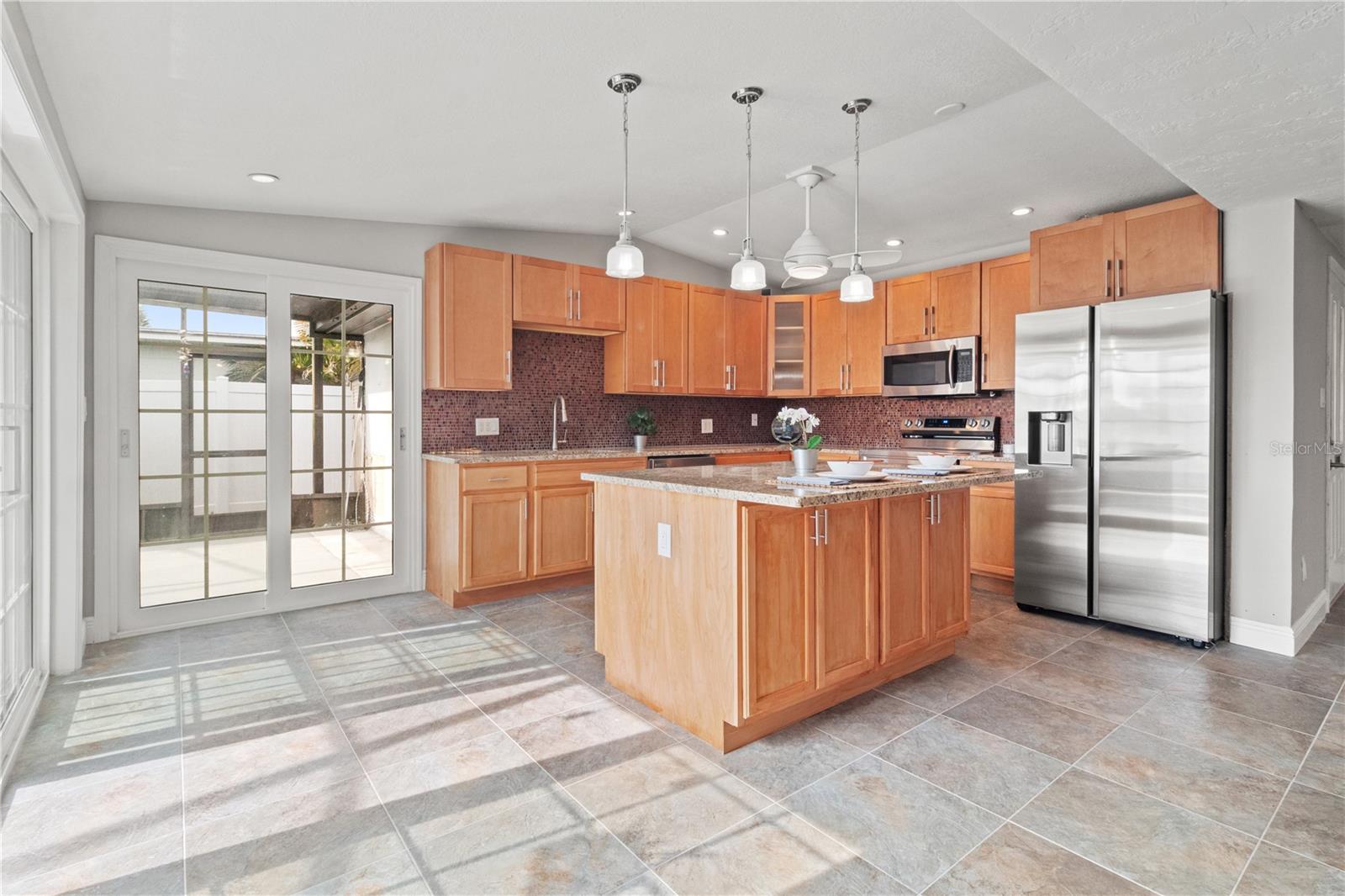 The kitchen Island has breakfast bar and plenty of extra storage