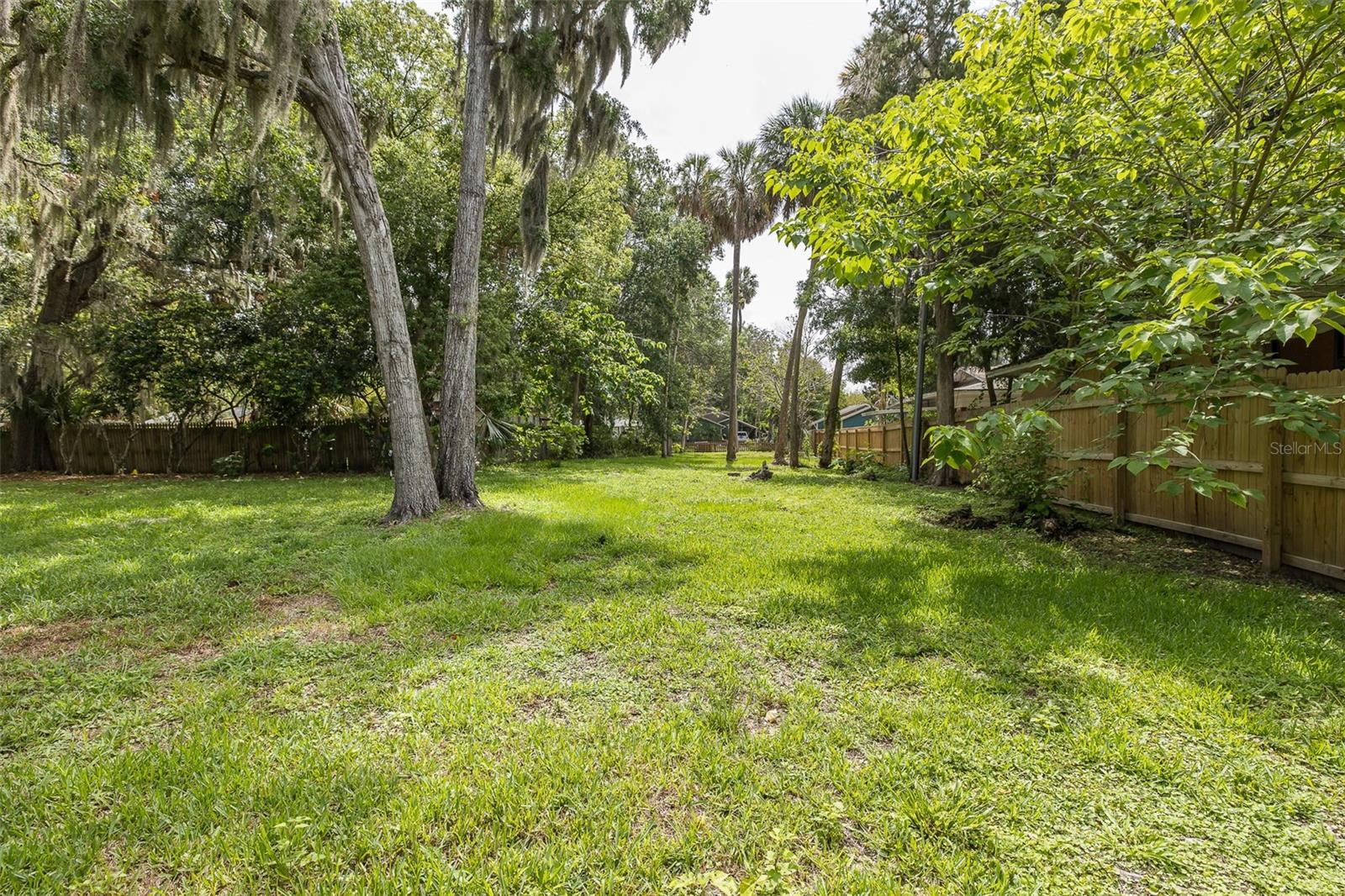 HUGE FENCED IN YARD