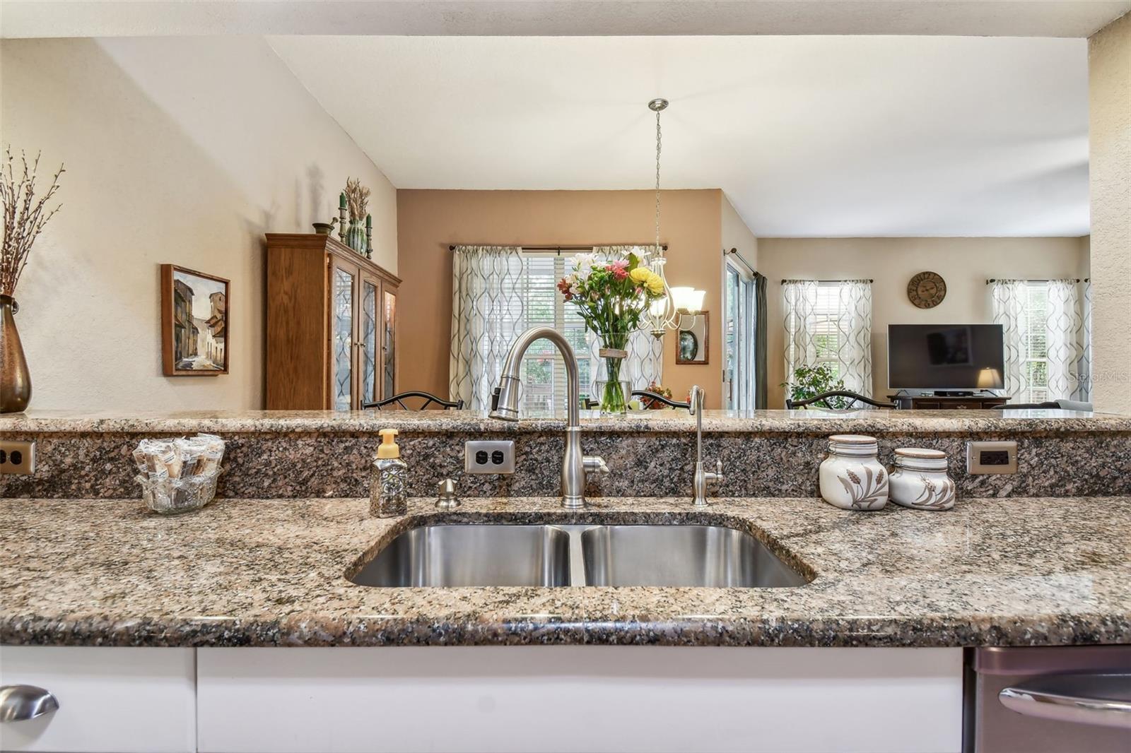 Kitchen is open to dining room.