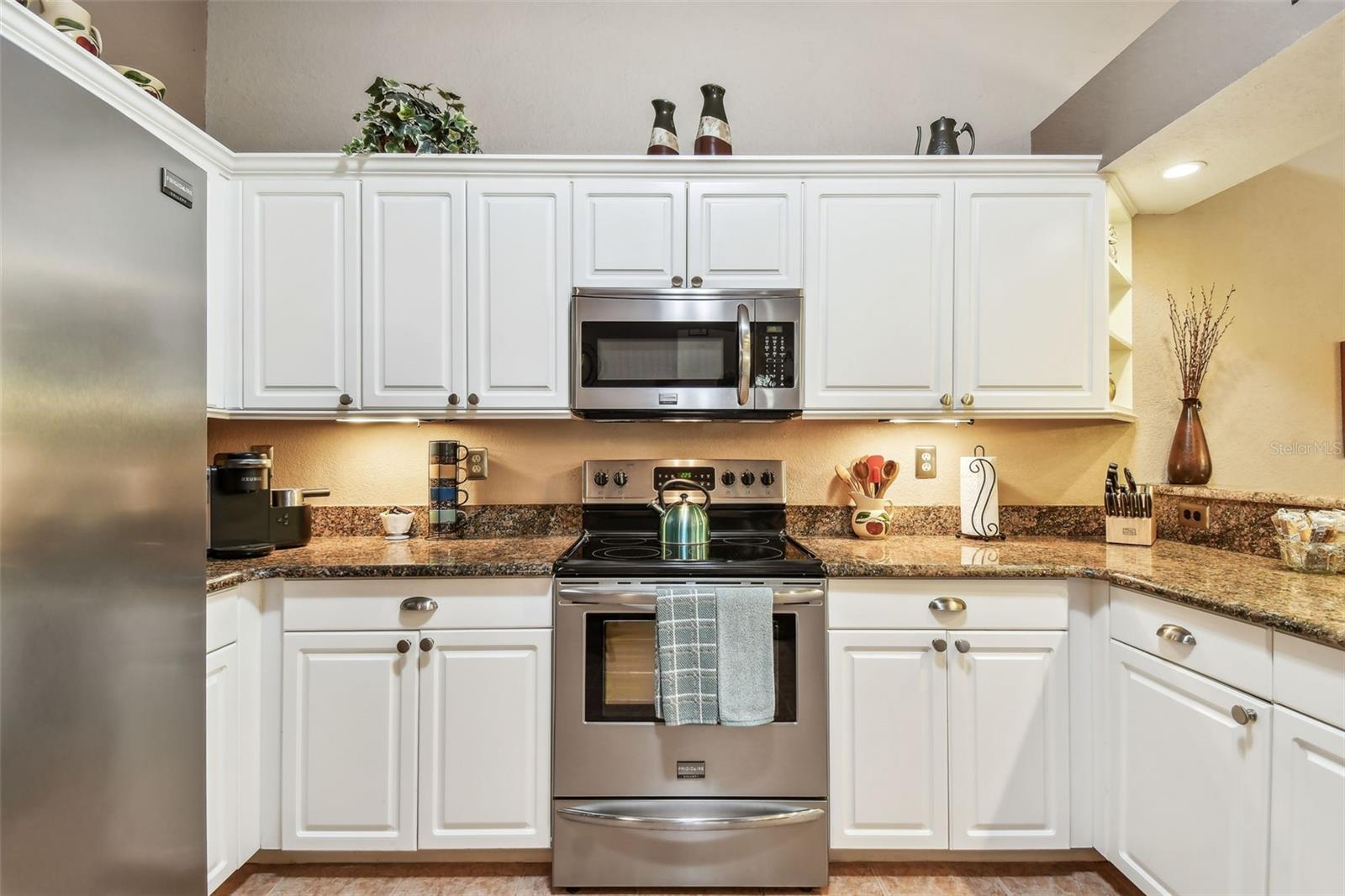 The kitchen has lots of storage and counter space.