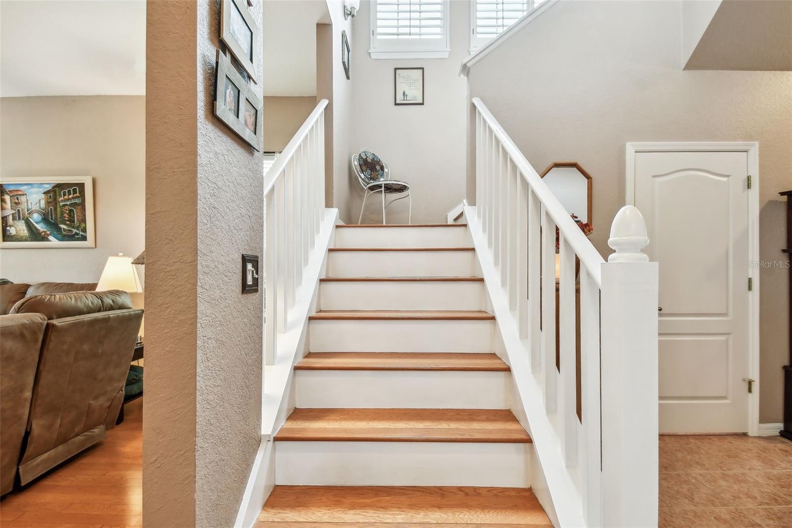 The door to the right leads to the powder room.