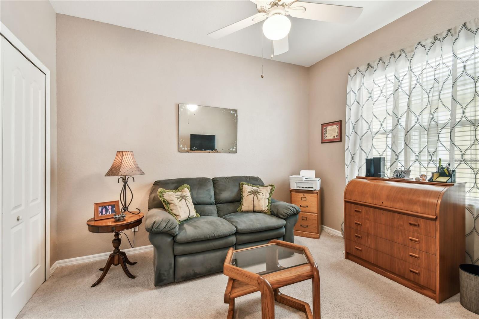 Bedroom currently utilized as a sitting area.