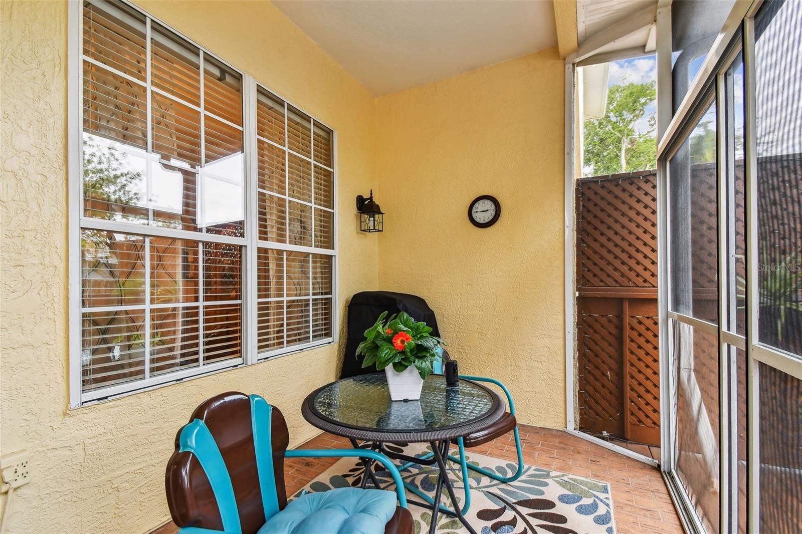 Nice sitting area in the screen enclosed patio.