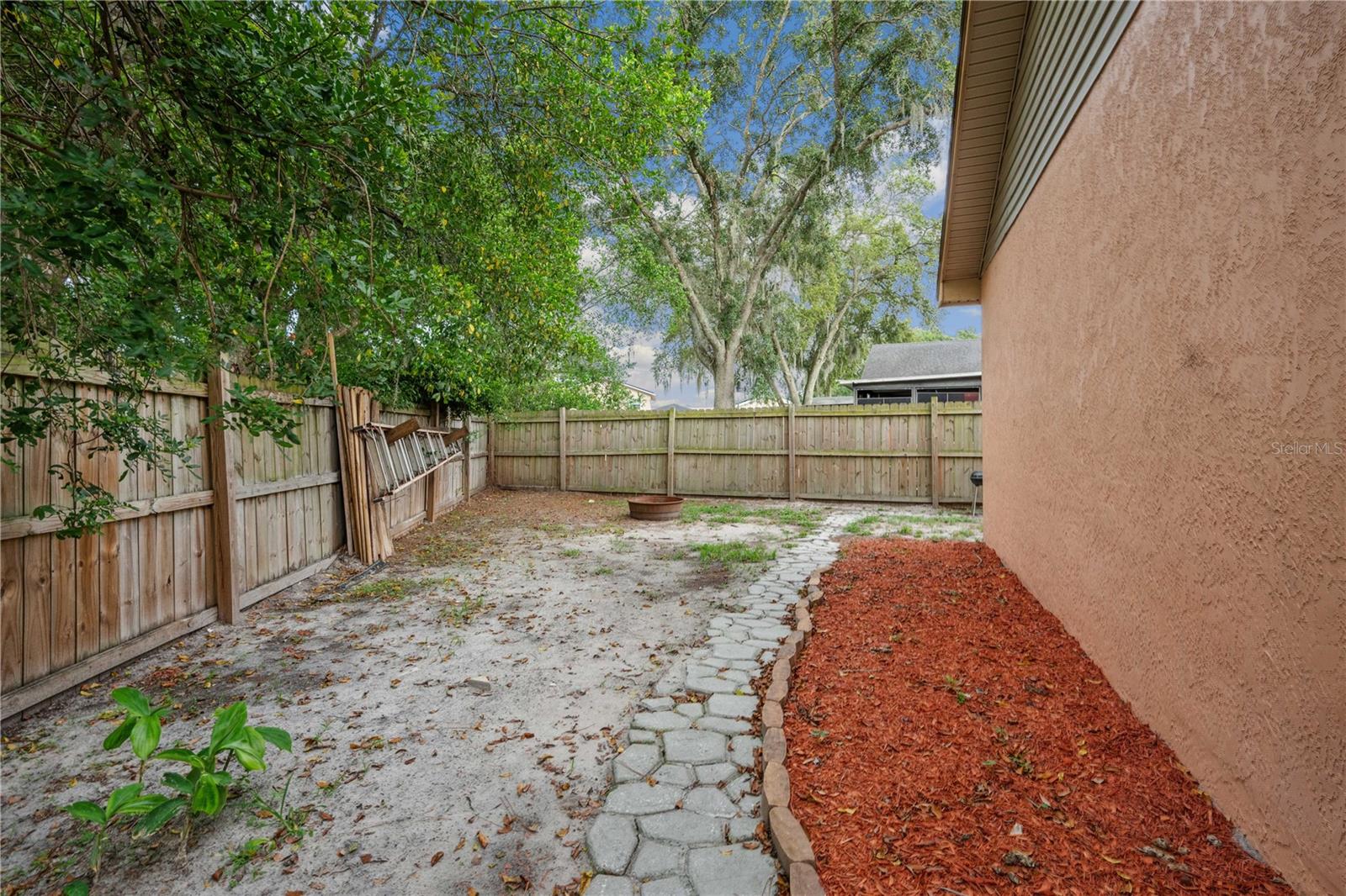 Yard across the back of the home