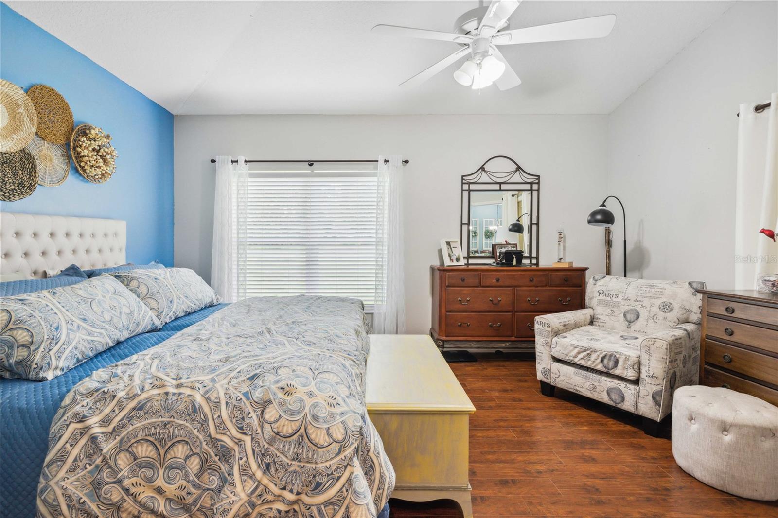 Primary bedroom with view of golf course