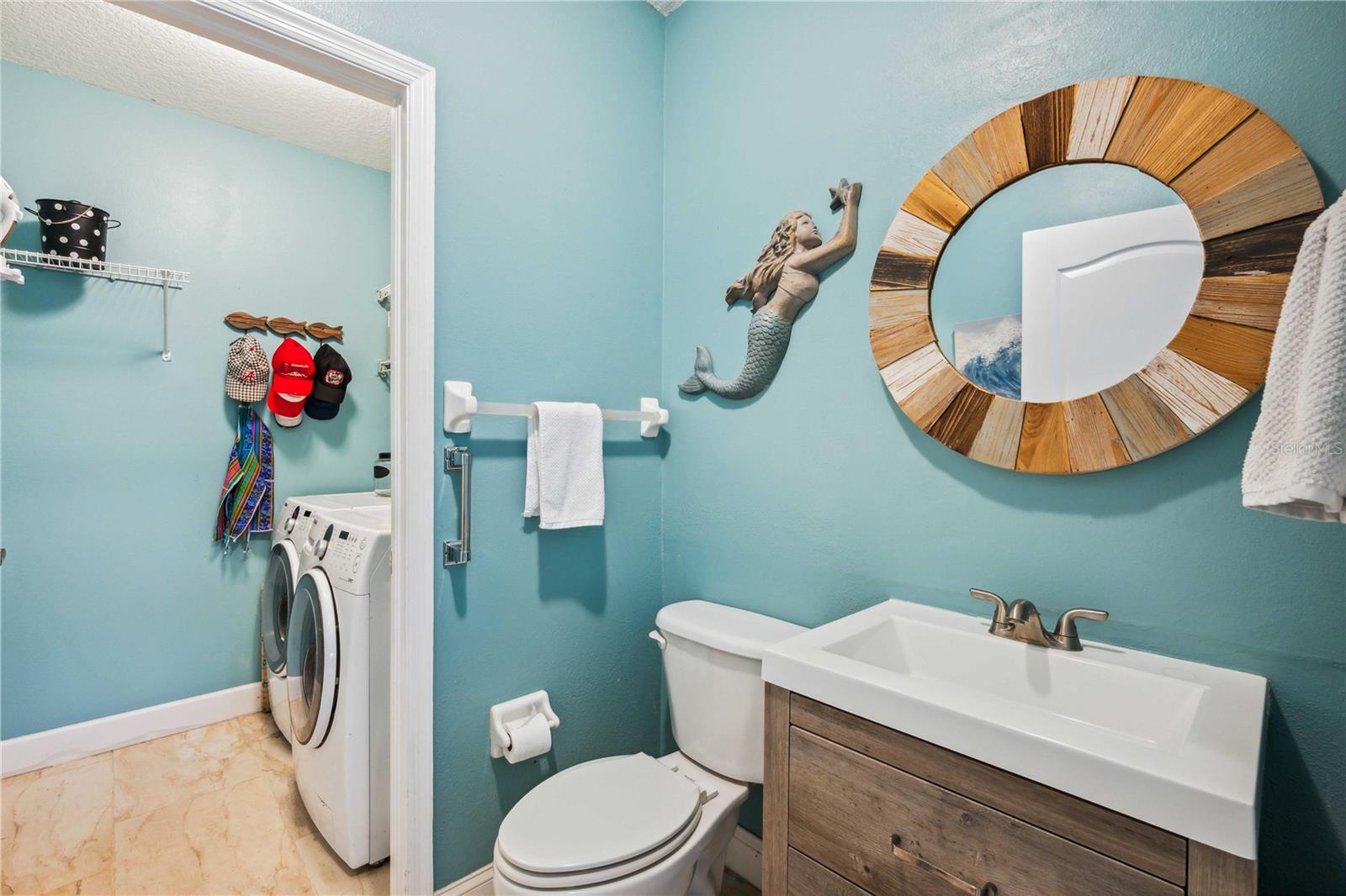 Half bath into laundry room