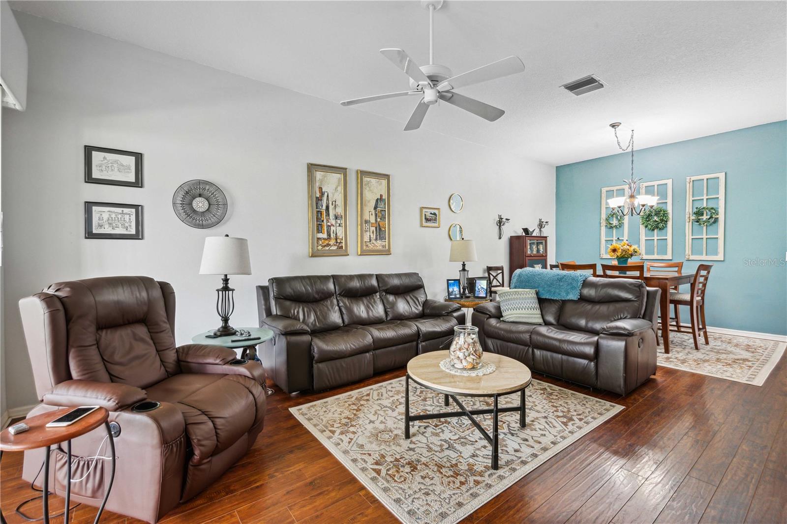 Living room with view of dining room