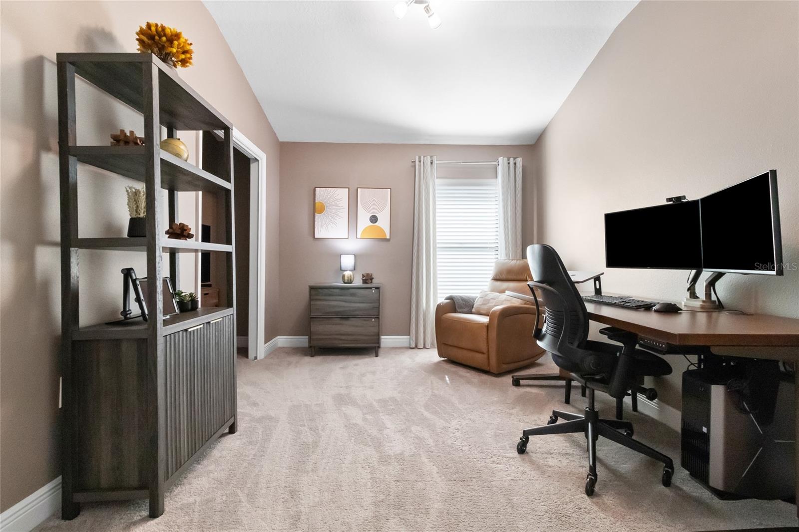 4th Bedroom is used as an office by these sellers. Freshly painted neutral paint and ceiling light fixture- Clean and good interior lighting.