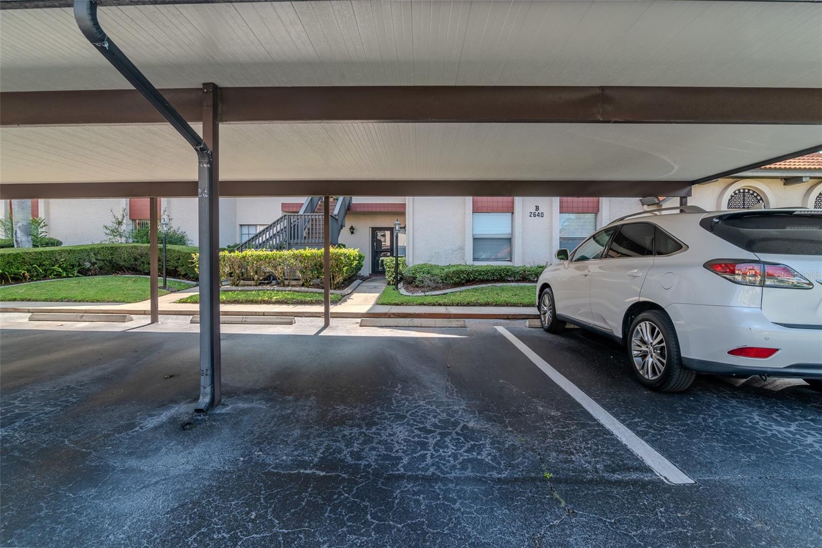 Dedicated carport just steps away