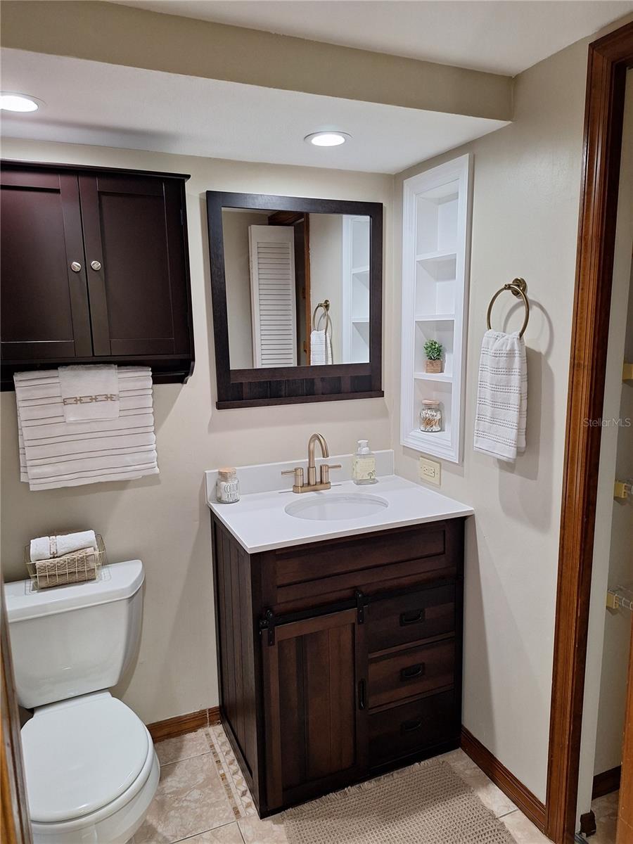 guest bath to the right after entering the unit