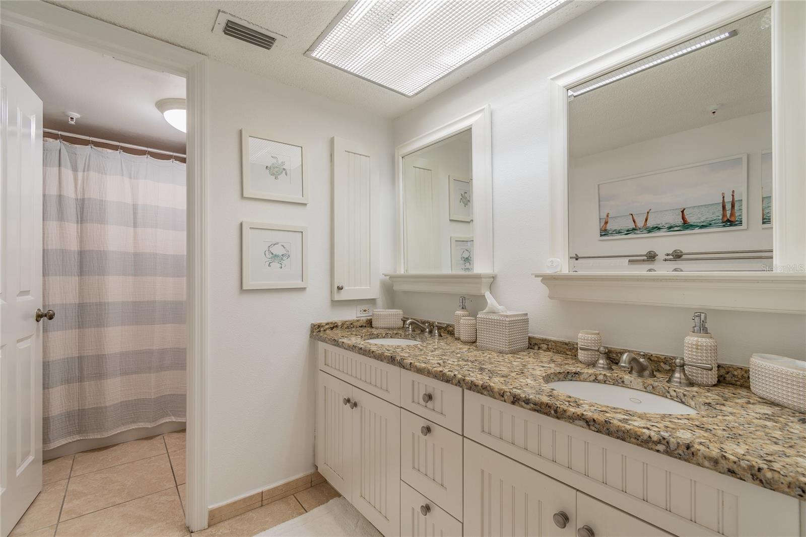 Double vanities in the bathroom as well as a separate commode and shower for convenience and privacy!