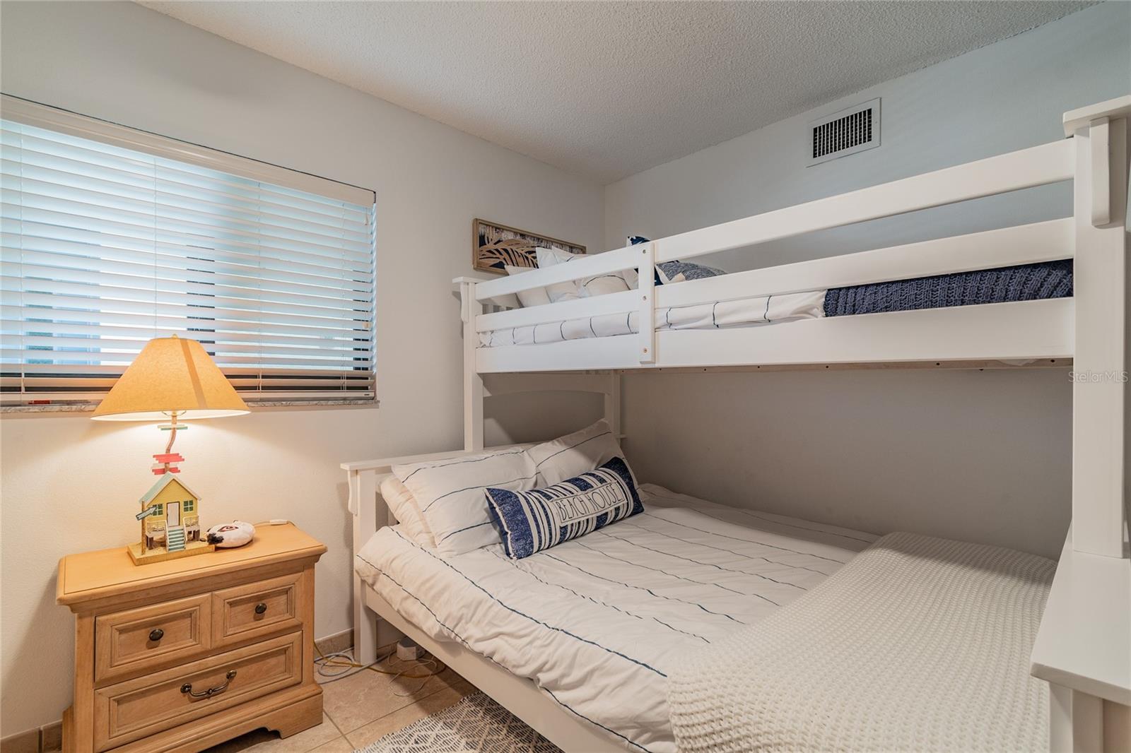 The guest room sleeps 5, with two comfy bunkbeds!