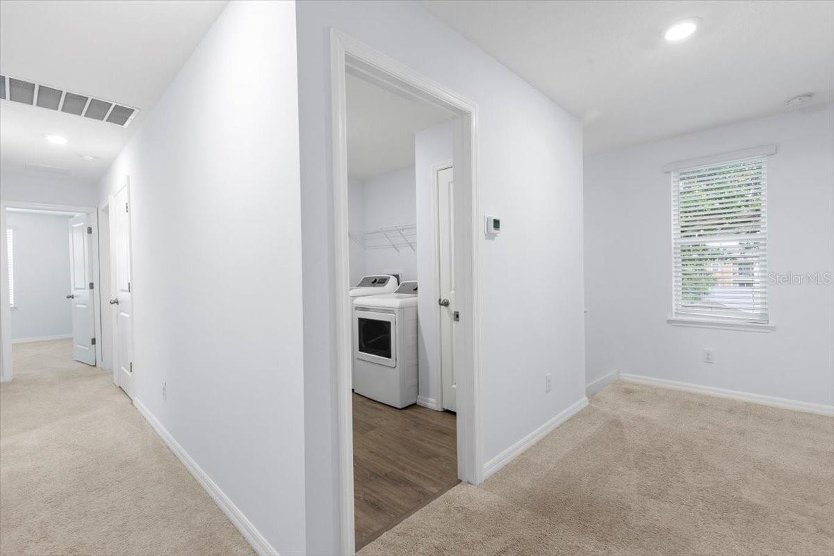 Upstairs, entrance to laundry room.