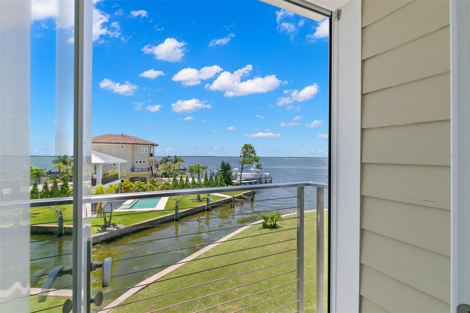 2nd bedroom view from patio to Gulf of Mexico