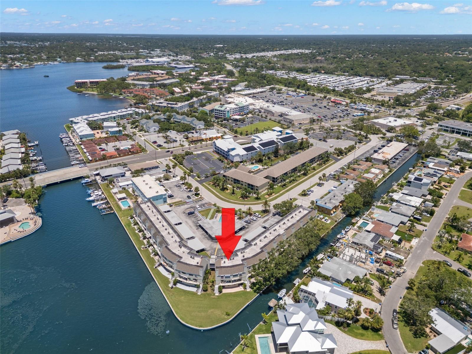 Shopping center on upper right side of photo with gym and restaurants.