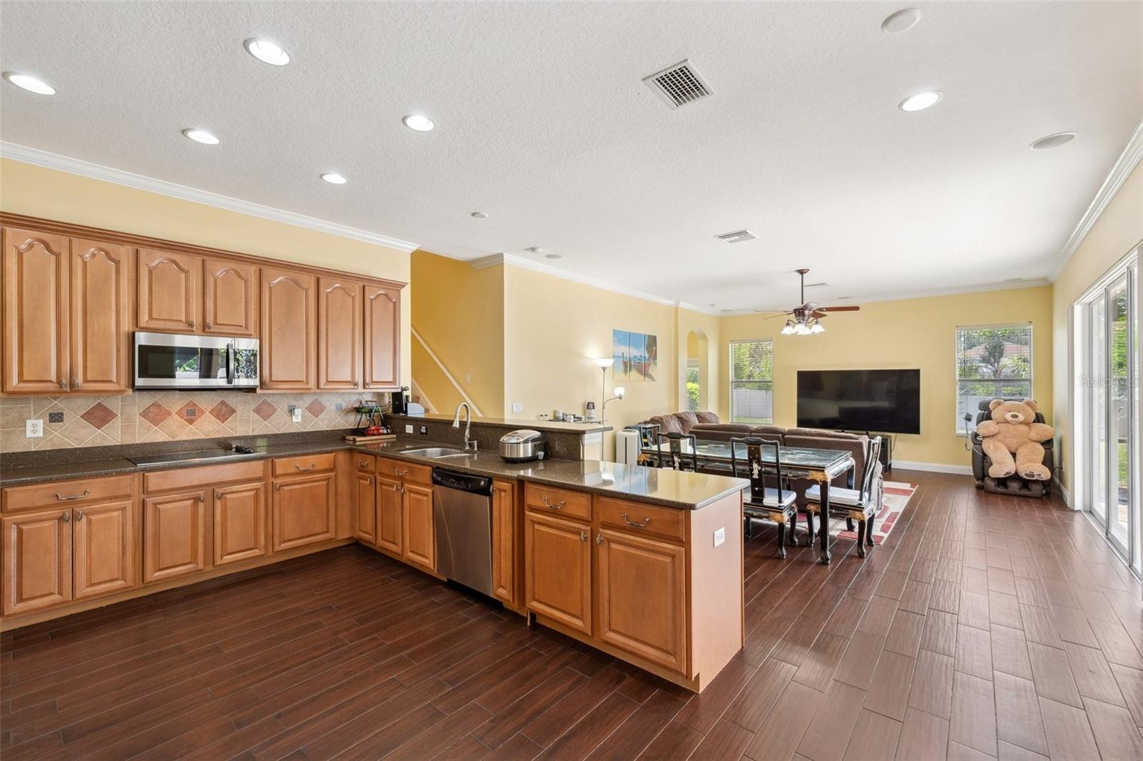 Kitchen island is moveable & extends the breakfast bar.