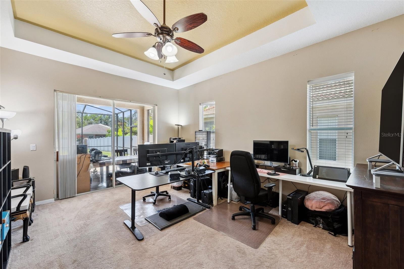 The primary bedroom is being used as the home office.