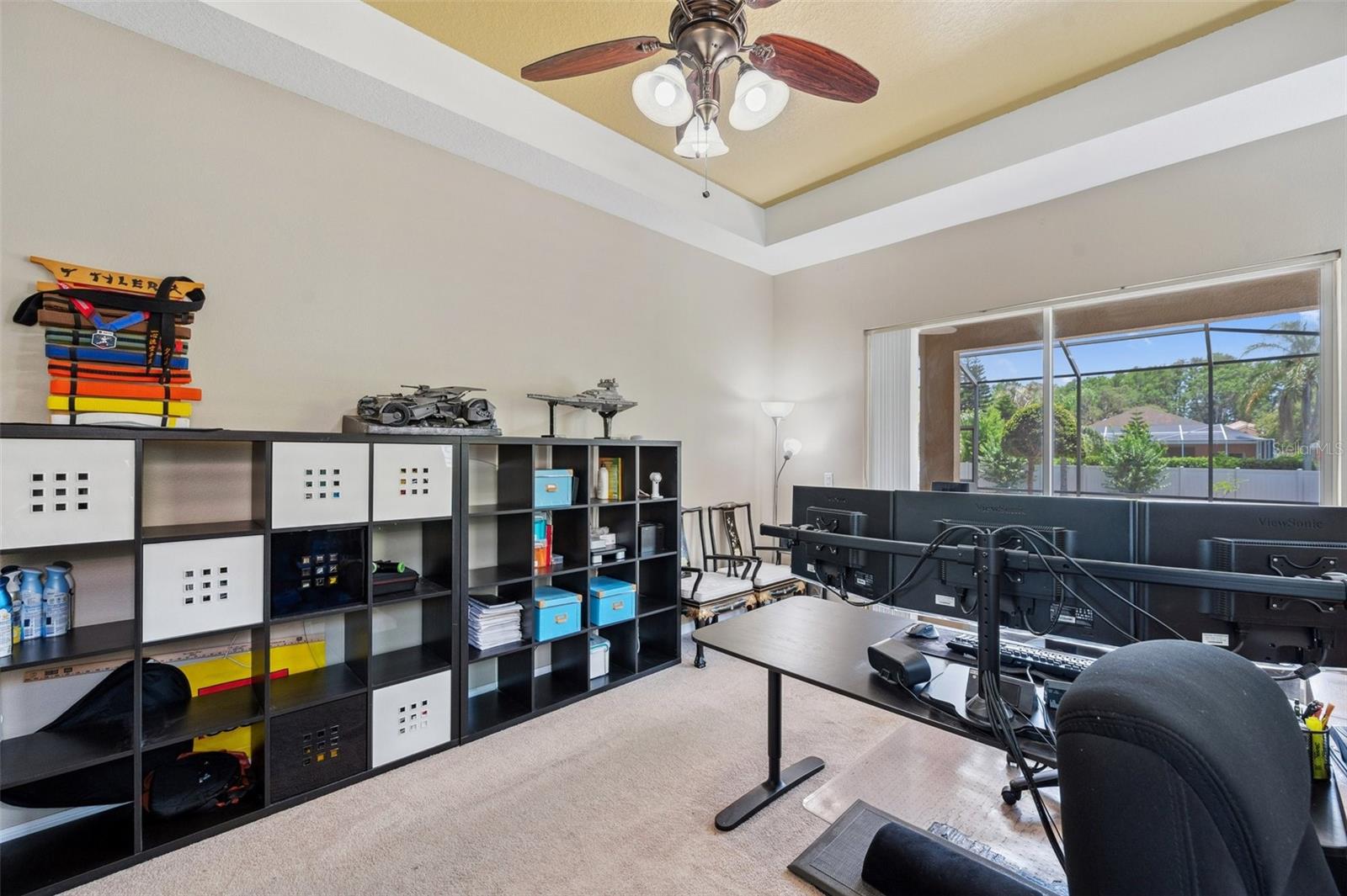 Tray ceiling, dual walk-in closets & access to lanai