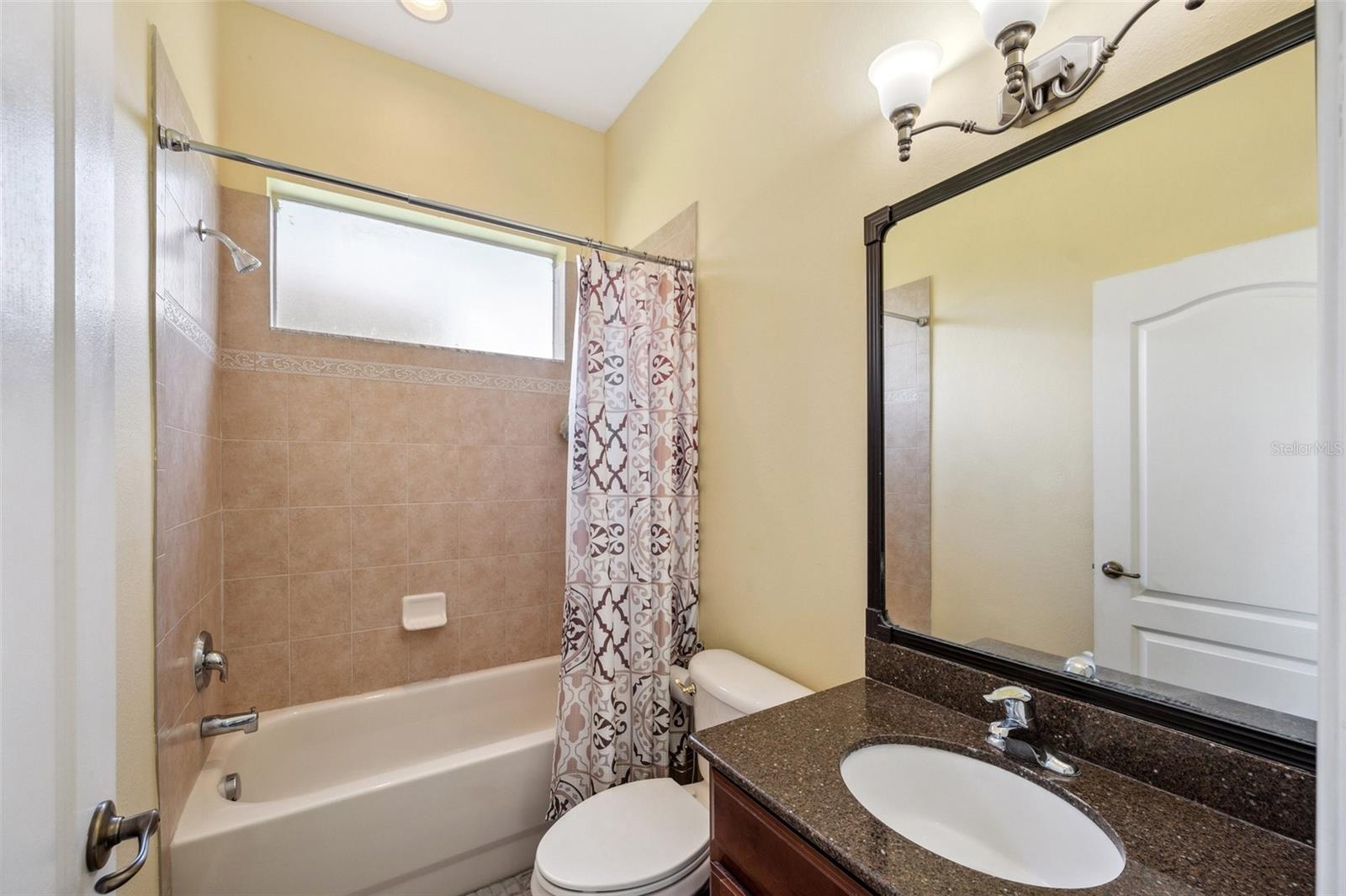 This 1st floor bathroom can be part of the junior primary guest suite.