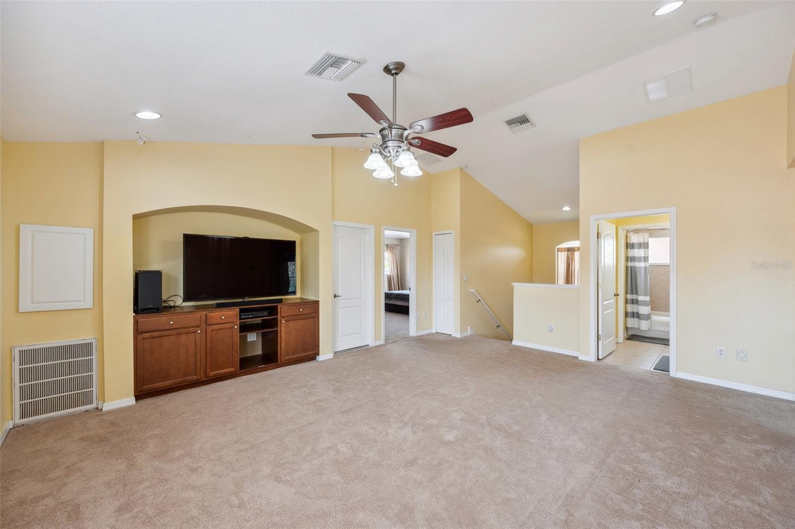 Loft features built-in media center & wired for surround sound.