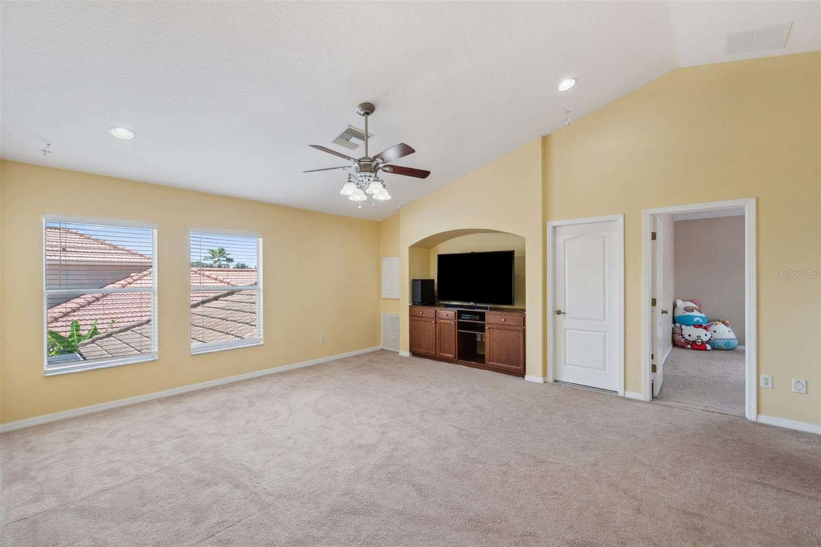 Billiards? Gym? Second family room? Design as desired.