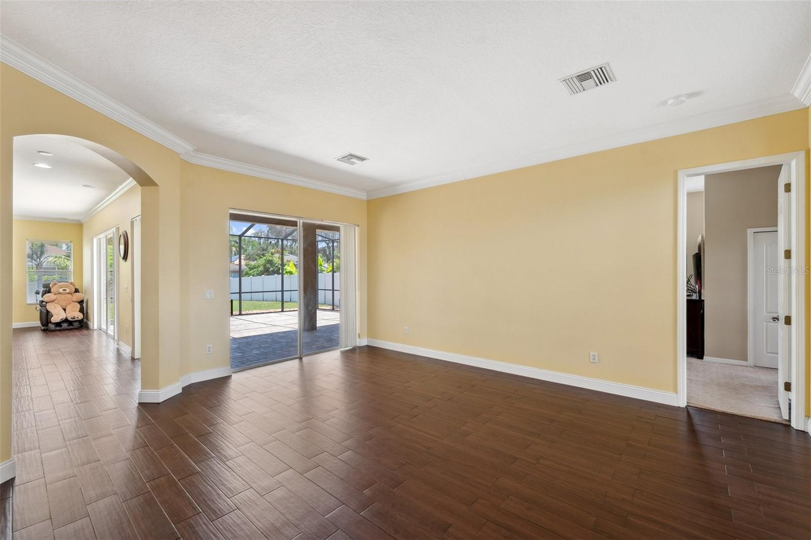 Formal living & dining rooms with access to lanai