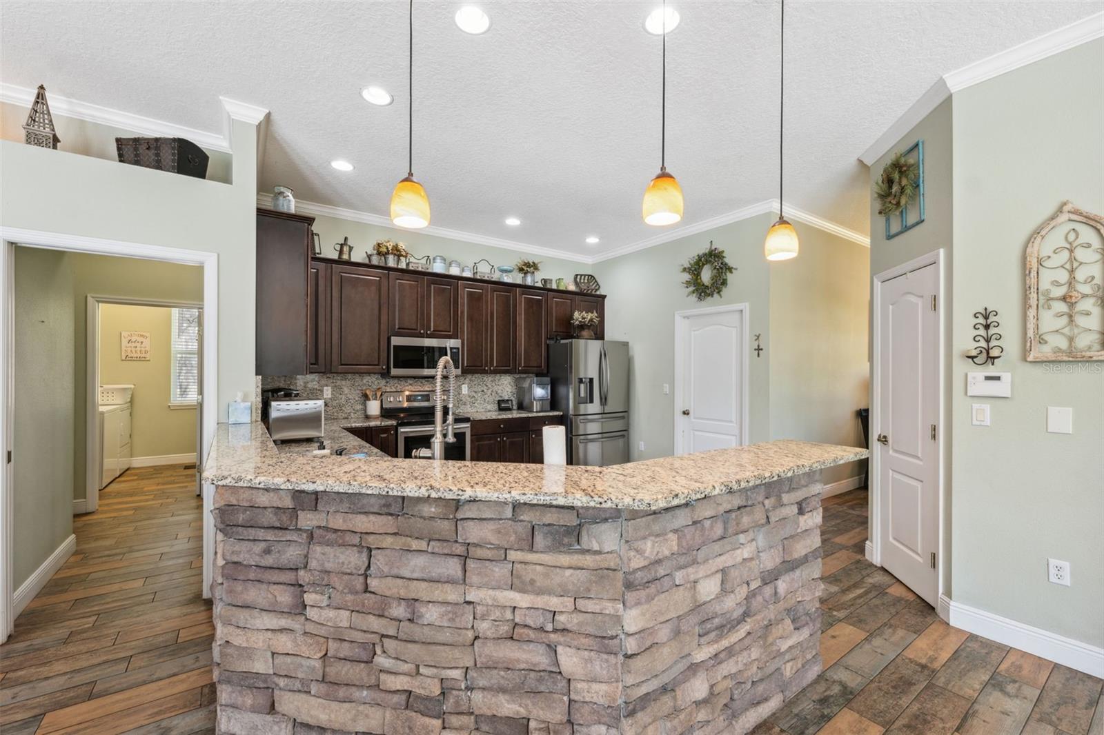 Kitchen opens up to the living room.