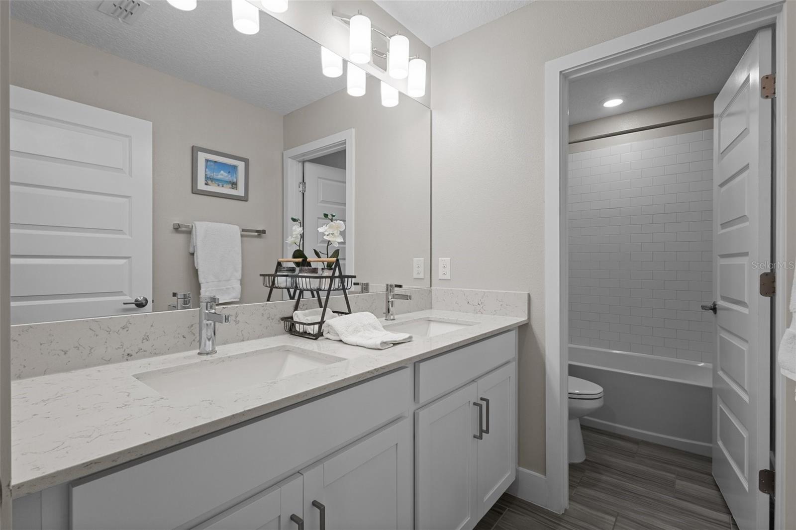 Bathroom 3 - full bathroom with tub/shower that is between bedrooms 2, 3, and 4
