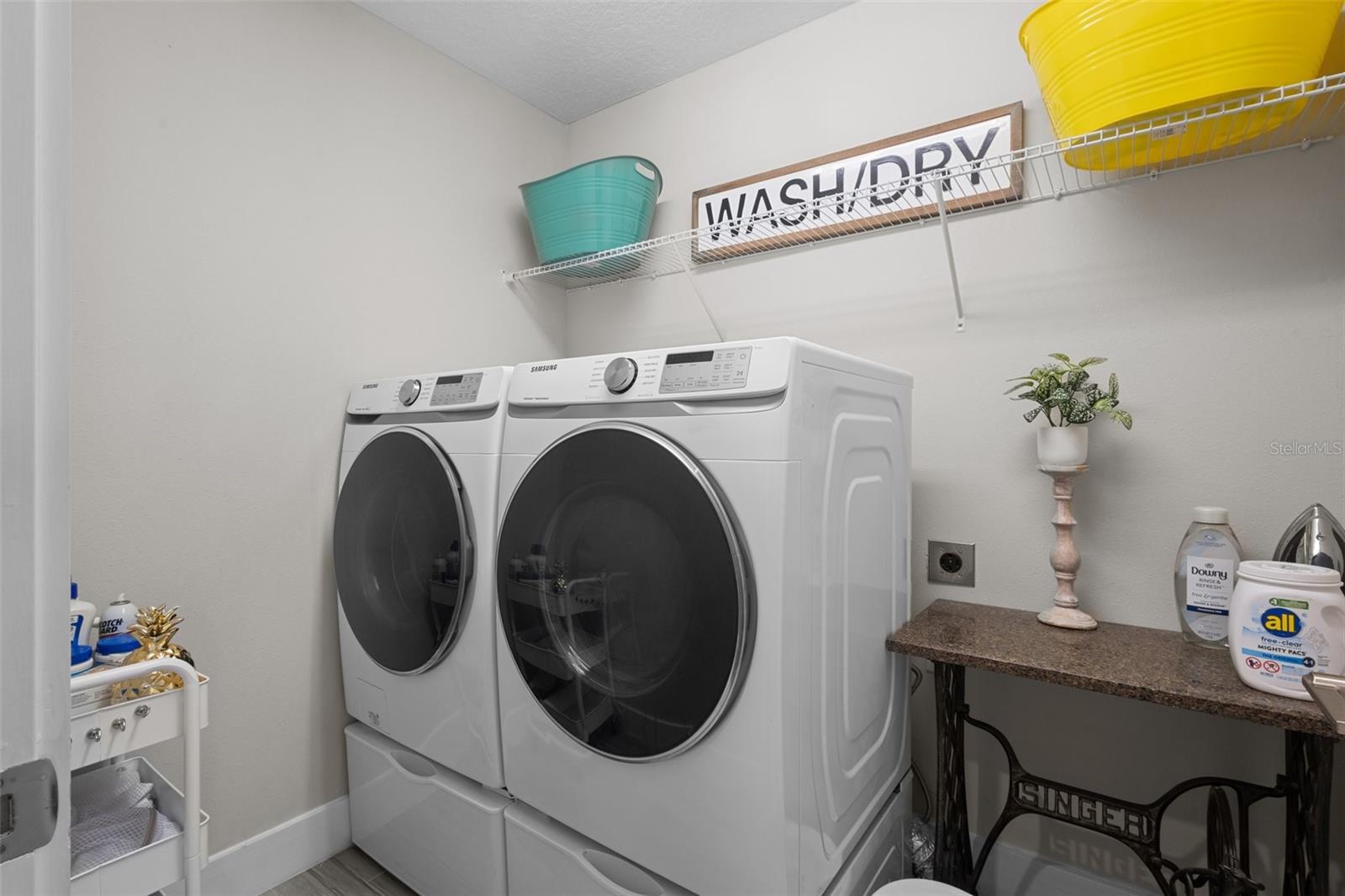 Laundry Room upstairs (just outside or primary bedroom)