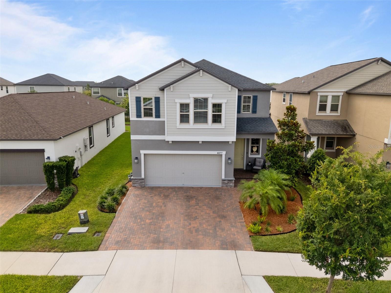 Elevated vide of front of home - notice widened driveway