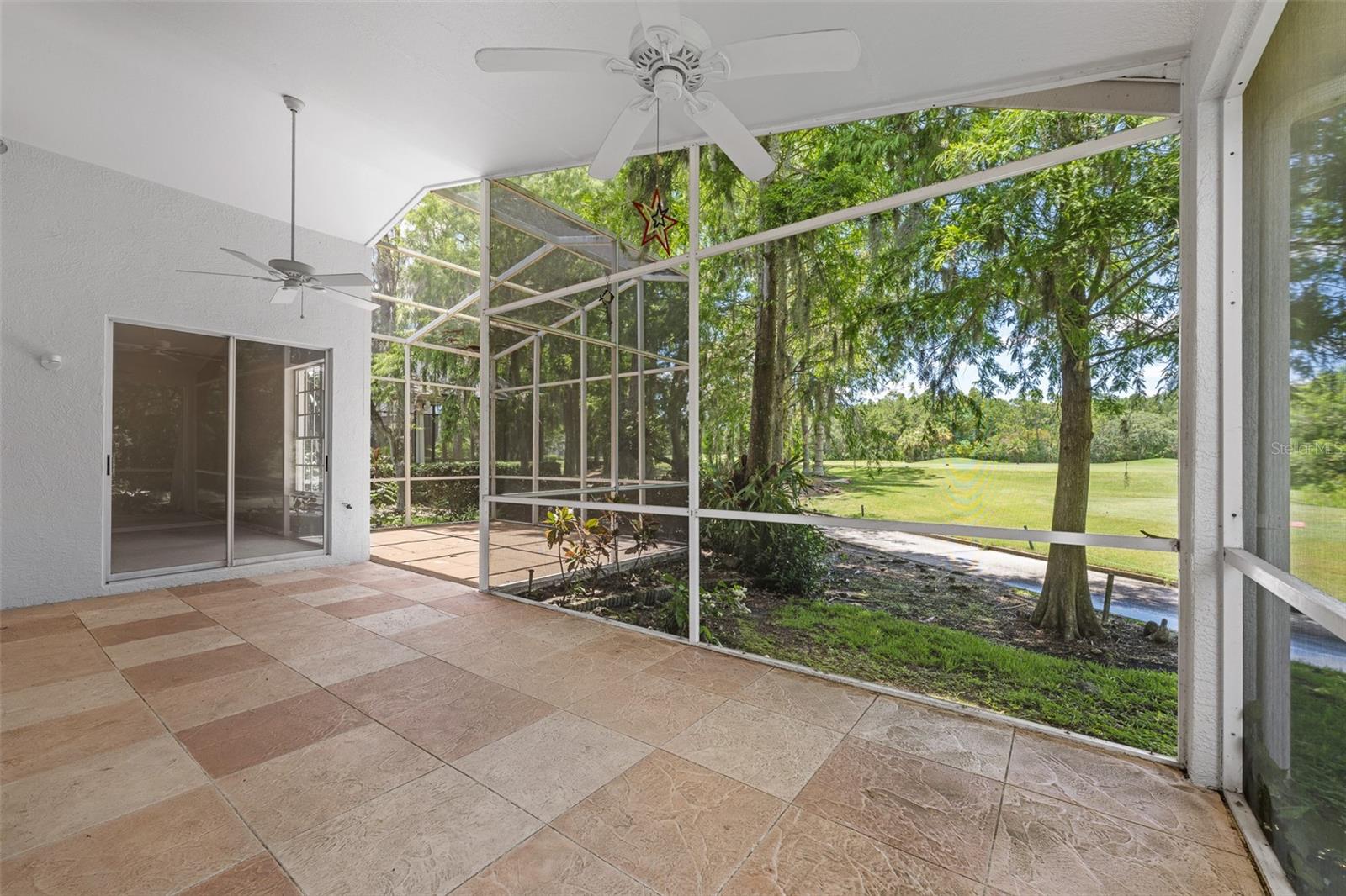 Nearly 600 sqft covered and screened lanai overlooking the picturesque views of the Golf Course.