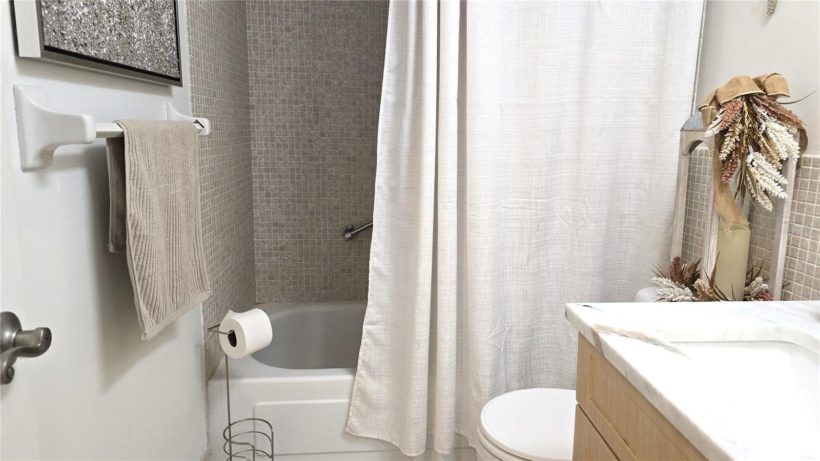 Second bathroom has a tub