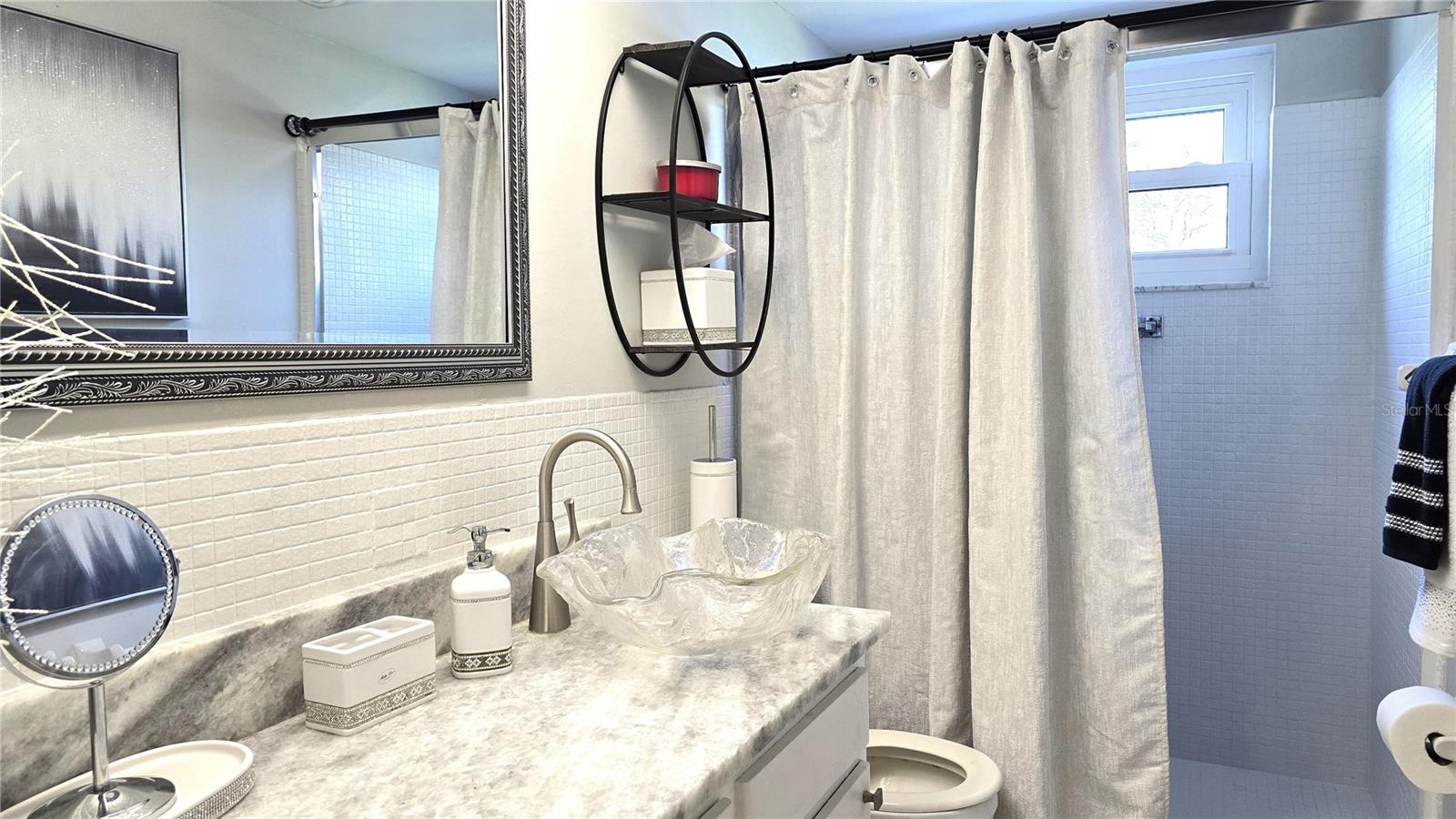 En suite in master-look at water while showering
