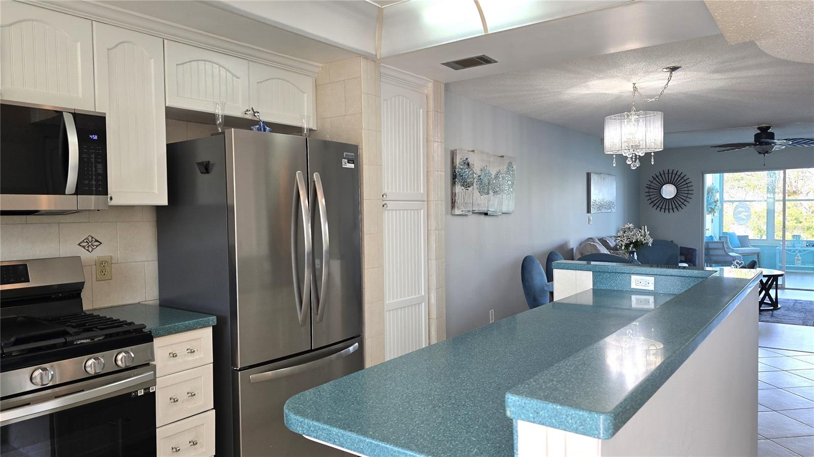 Remodeled Kitchen with large pantry with pull out shelves