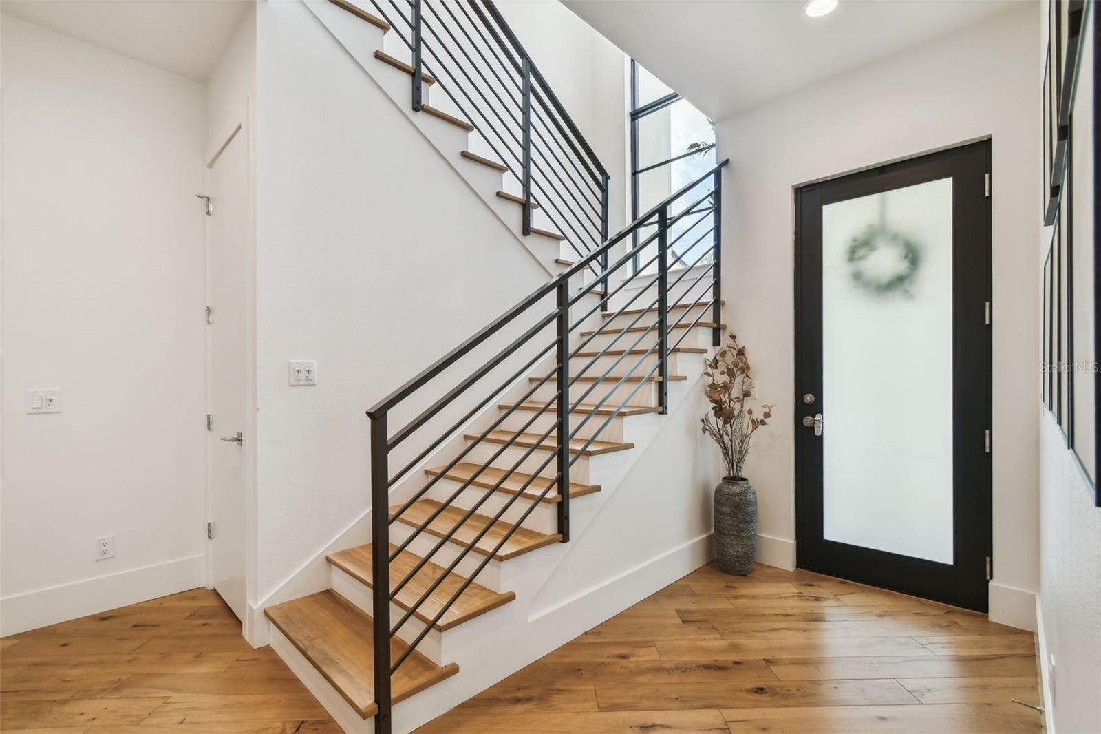 Tons of storage under staircase