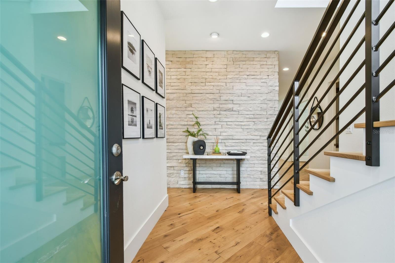 Dramatic Limestone accent wall.