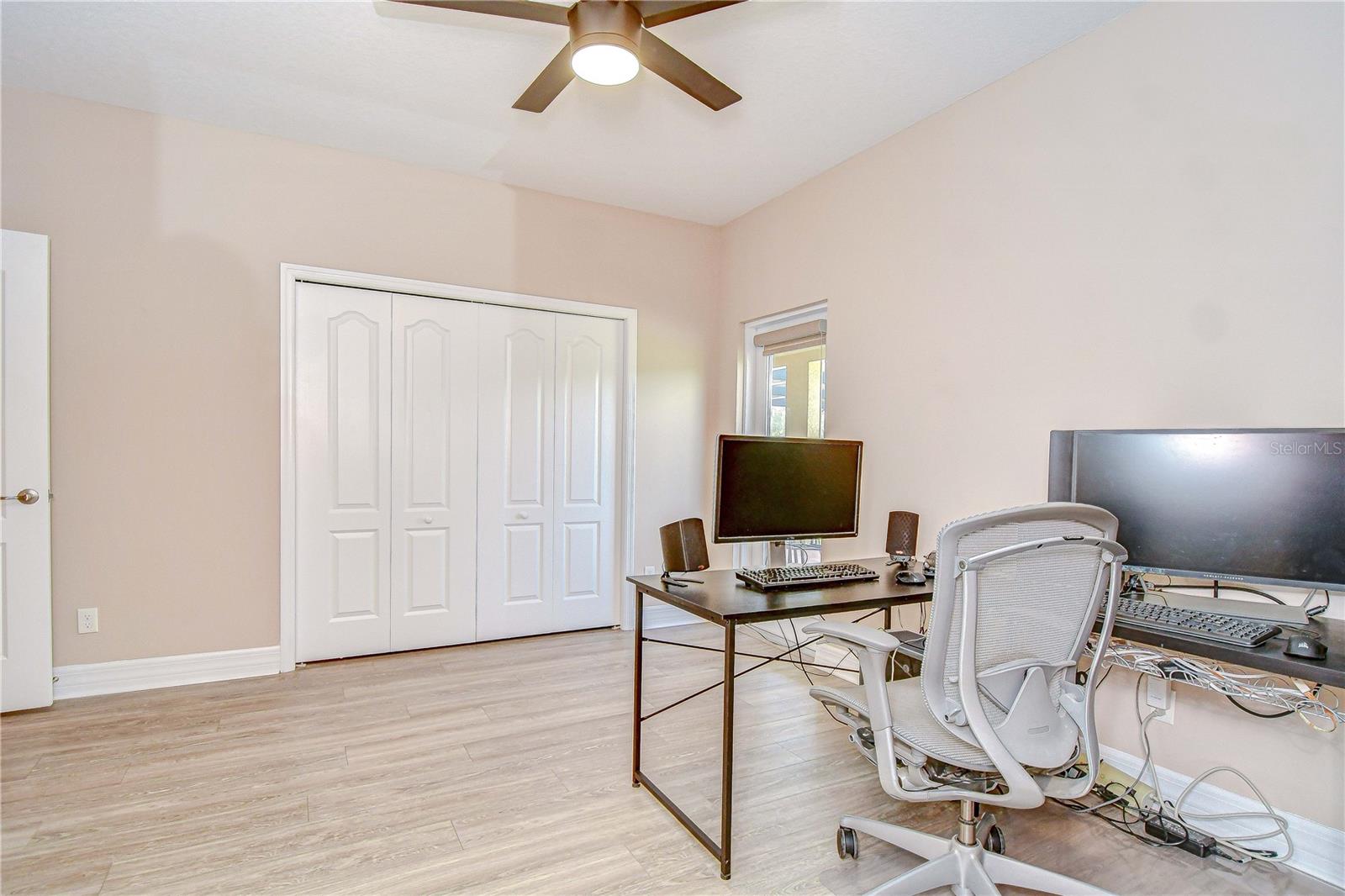 Large bedroom 5/office upstairs and French door access to balcony