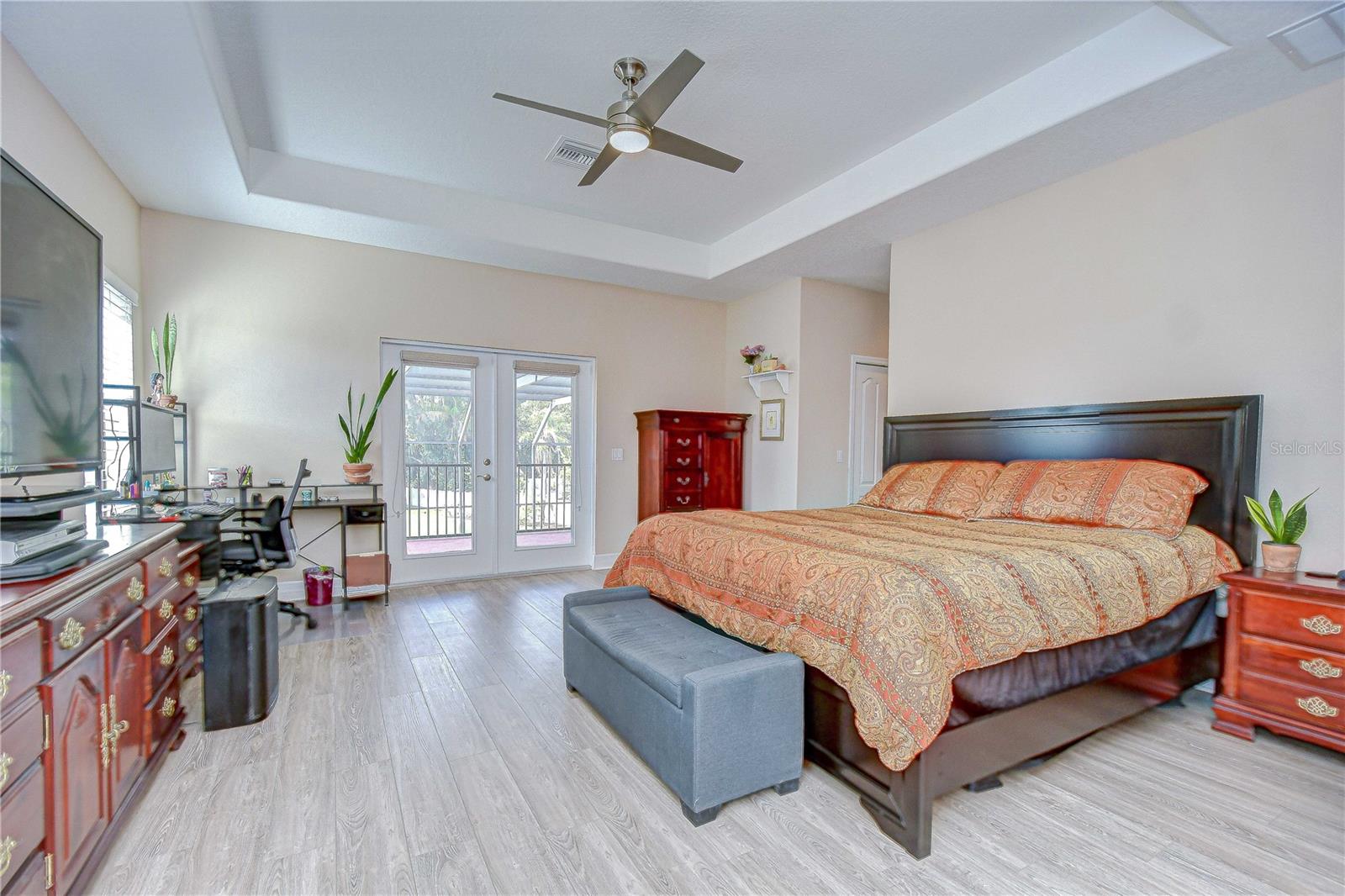 Primary bedroom with upstairs balcony access