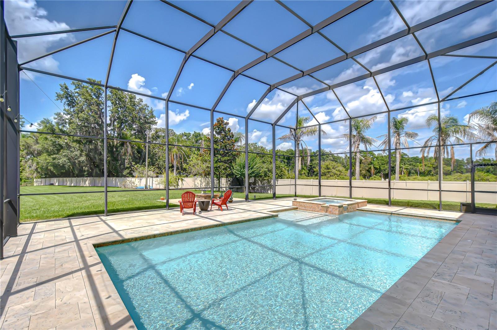Oversized pool with spill in spa