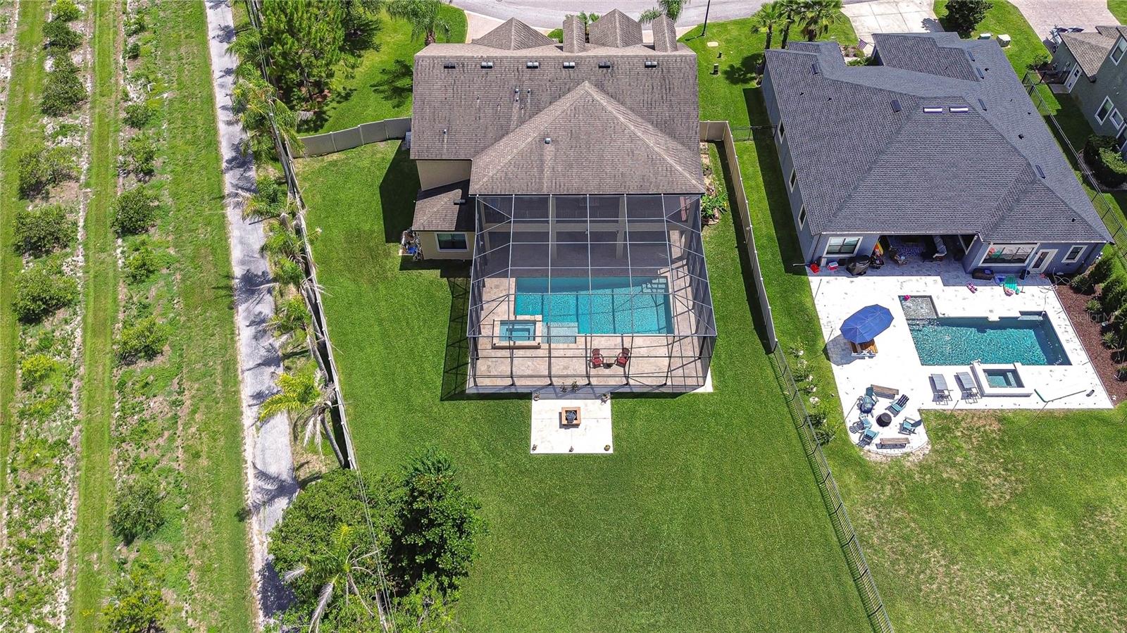 Extra large back yard and beautiful aerial view of home