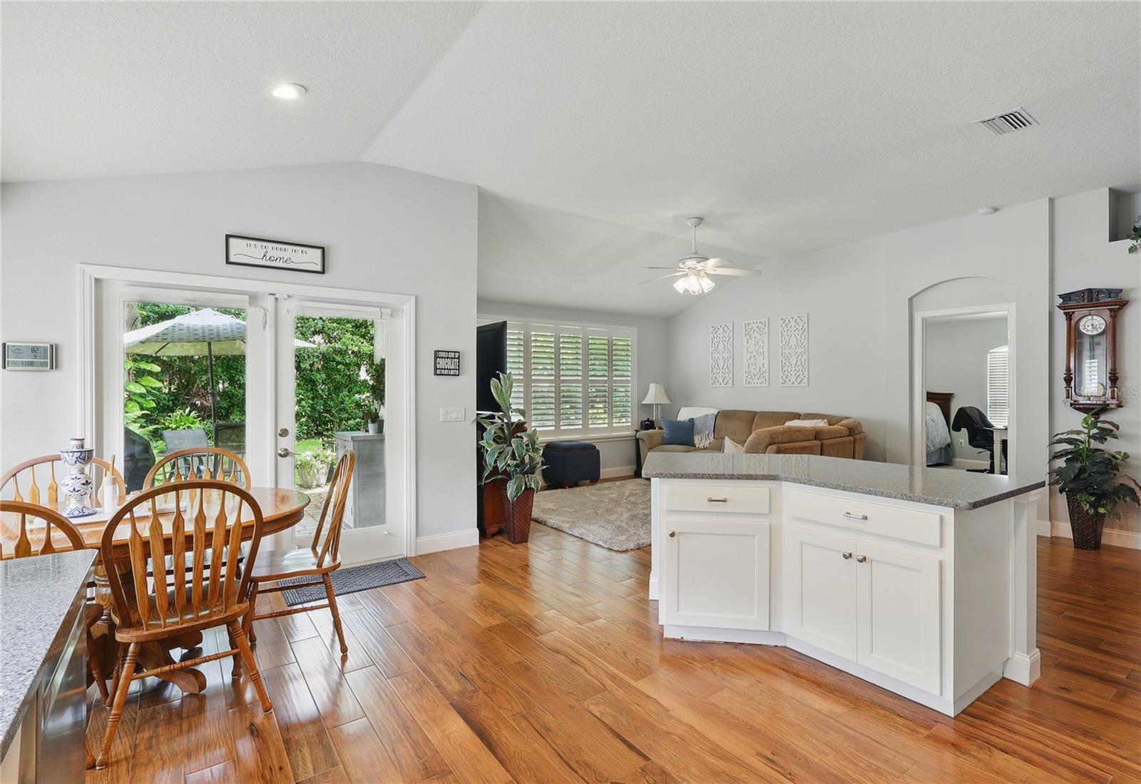 Glancing back toward the living room from the kitchen.