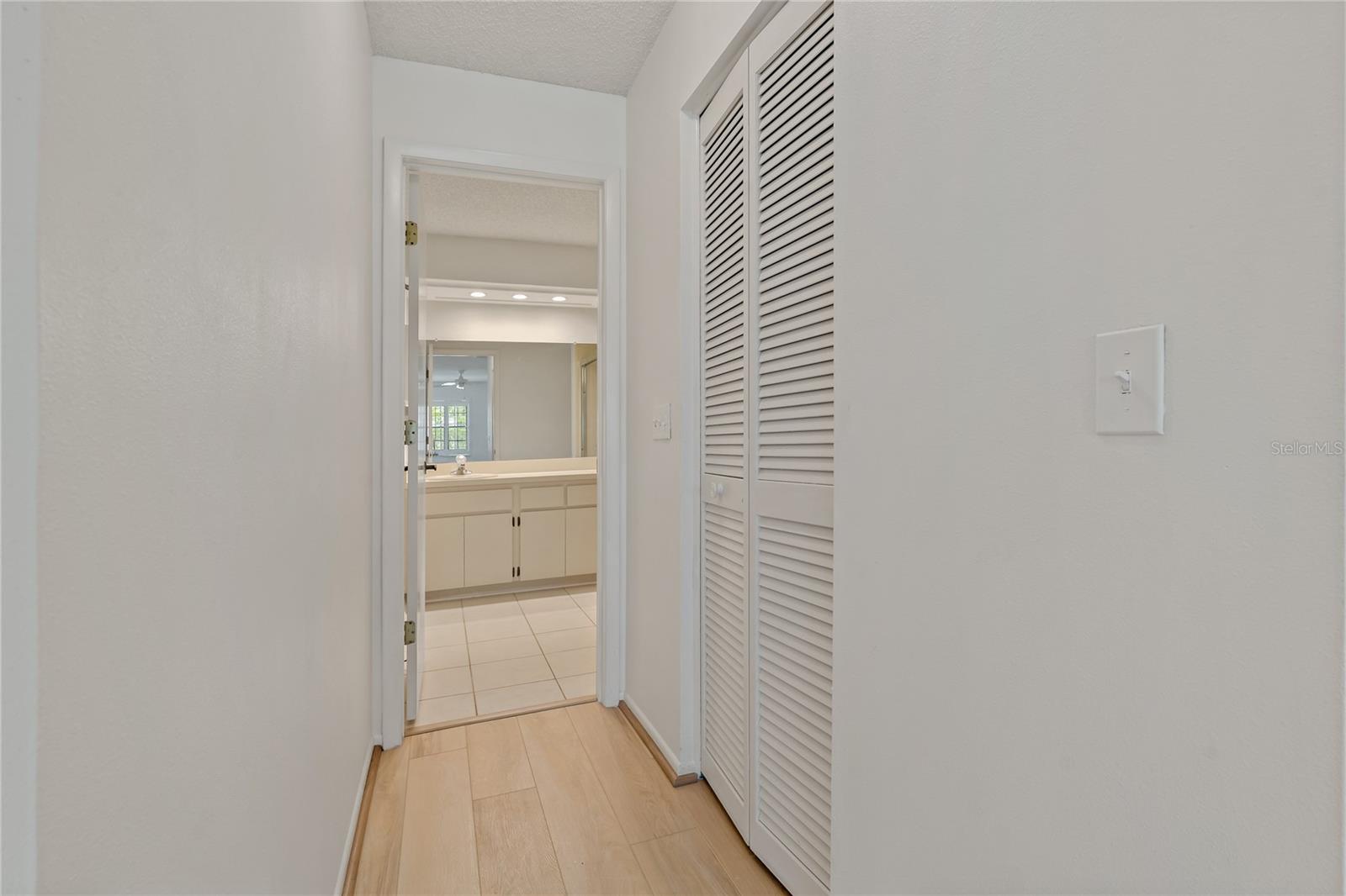 PRIMARY CLOSET AND BATHROOM