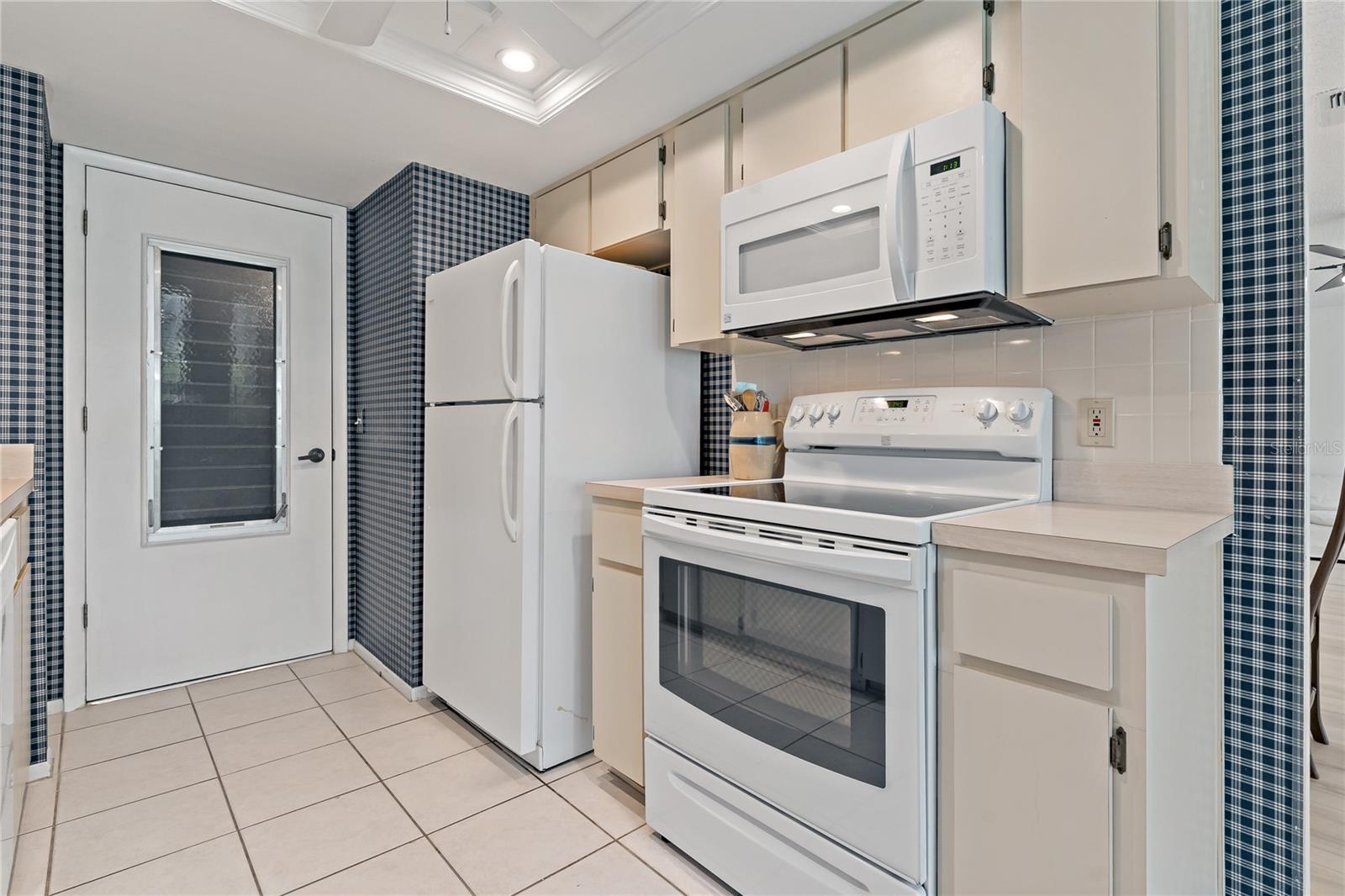 GARAGE ACCESS IS RIGHT OFF THE KITCHEN ~ CONVENIENT FOR GROCERY SHOPPING!