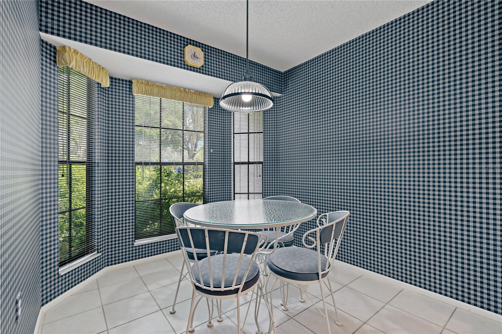 BREAKFAST NOOK IN THE KITCHEN ~ PERFECTLY POSITIONED BY THE BAY WINDOWS!